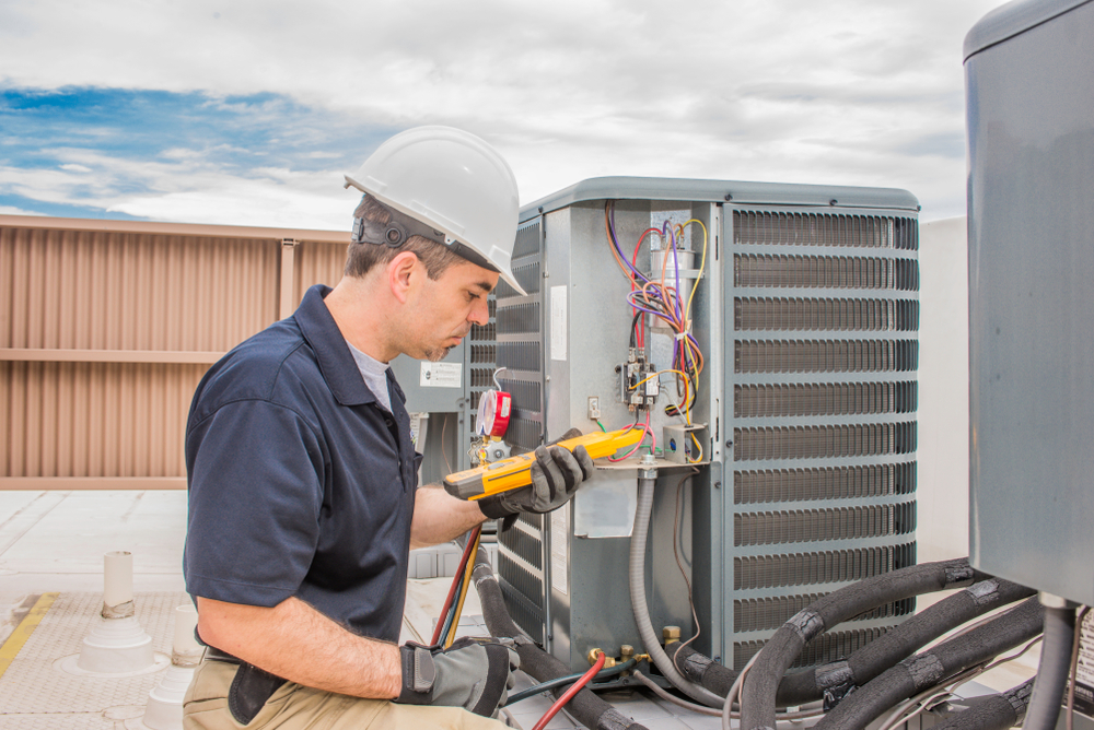 Working on air conditioner unit
